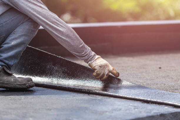 Professional Basement Waterproofing technician working in Eaton, IN
